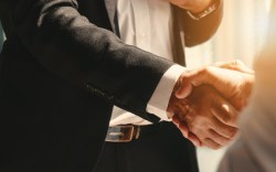 business background of businessman having handshake