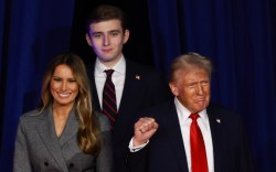 Republican presidential nominee, former U.S. President Donald Trump arrives to speak with former first lady Melania Trump and Barron Trump during an election night event at the Palm Beach Convention Center on November 06, 2024 in West Palm Beach, Florida.