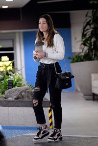 PREMIUM EXCLUSIVE: Jessica Biel smiles but doesn’t comment when asked if all is fine after husband Justin Timberlake was spotted holding hands with his sexy co-star on a night out. Timberlake and Biel are widely considered to have one of the most solid marriages in Hollywood, with both regularly posting heartfelt videos on Instagram. But Biel will have not been impressed by photographs of her husband clutching the arm of 30-year-old Alisha Wainwright in New Orleans, before she tenderly rested her hand on his right knee. The pair - who play on-screen lovers ion their latest movie - then gripped each other’s hands tightly as they sat intimately chatting and drinking after a day’s filming. Timberlake, not wearing the wedding band he was seen wearing earlier in the week, wrapped both his hands around Wainwright’s and looked longingly into her eyes. The photos risk breaking the heart of Biel, 37, his wife of seven years, and mother of the couple’s son, Silas, 4. 25 Nov 2019 Pictured: Jessica Biel. Photo credit: Rachpoot/Dean/MEGA TheMegaAgency.com +1 888 505 6342 (Mega Agency TagID: MEGA556344_001.jpg) [Photo via Mega Agency]