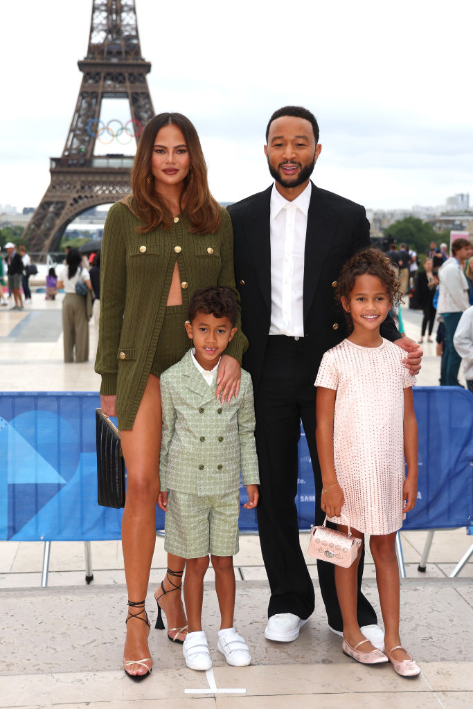 PARIS, FRANCE - JULY 26: Chrissy Teigen and John Legend attend with son Miles and daughter Luna the red carpet ahead of the opening ceremony of the Olympic Games Paris 2024 on July 26, 2024 in Paris, France. (Photo by Matthew Stockman/Getty Images)