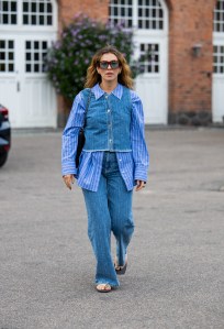 COPENHAGEN, DENMARK - AUGUST 07: Masha Sedgwick wears striped button shirt, jeans, top outside Baum & Pferdgarten during day three of the Copenhagen Fashion Week (CPHFW) SS25 on August 07, 2024 in Copenhagen, Denmark. (Photo by Christian Vierig/Getty Images)