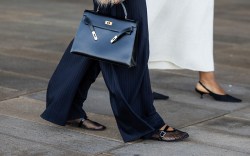 Street style photo of woman in flats