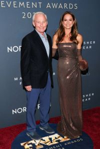 NEW YORK, NEW YORK - DECEMBER 04: (L-R) David Weinberg and Brooke Burke attend the 38th Annual Footwear News Achievement Awards at Cipriani South Street on December 04, 2024 in New York City. (Photo by Dia Dipasupil/Getty Images)