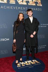 NEW YORK, NEW YORK - DECEMBER 04: (L-R) Alissia Benveniste and Phileo Landowski attend the 38th Annual Footwear News Achievement Awards at Cipriani South Street on December 04, 2024 in New York City. (Photo by Dia Dipasupil/Getty Images)