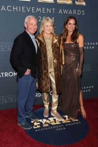 NEW YORK, NEW YORK - DECEMBER 04: (L-R) David Weinberg, Martha Stewart and Brooke Burke attend the 38th Annual Footwear News Achievement Awards at Cipriani South Street on December 04, 2024 in New York City. (Photo by Dia Dipasupil/Getty Images)