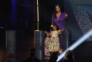 UNCASVILLE, CONNECTICUT - MAY 15: Vanessa Bryant stands with daughters Capri and Bianka after speaking on behalf of Class of 2020 inductee, Kobe Bryant during the 2021 Basketball Hall of Fame Enshrinement Ceremony at Mohegan Sun Arena on May 15, 2021 in Uncasville, Connecticut. Kobe Bryant tragically died in a California helicopter crash on Jan 26, 2020. (Photo by Maddie Meyer/Getty Images)