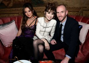 NEW YORK, NEW YORK - DECEMBER 15: (L-R) Ashley Park, Lily Collins and Charlie McDowell attend the Emily In Paris French Consulate Red Carpet at French Consulate on December 15, 2022 in New York City. (Photo by Jamie McCarthy/Getty Images for Netflix)