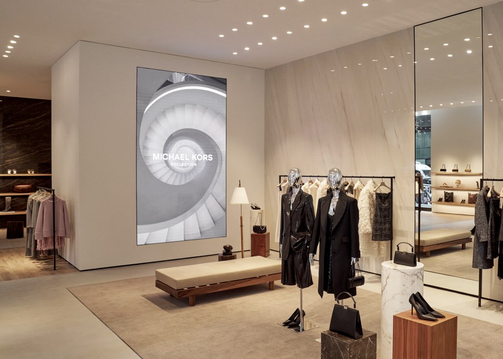 The interior of the Michael Kors boutique represents a new store concept for Michael Kors Collection stores.