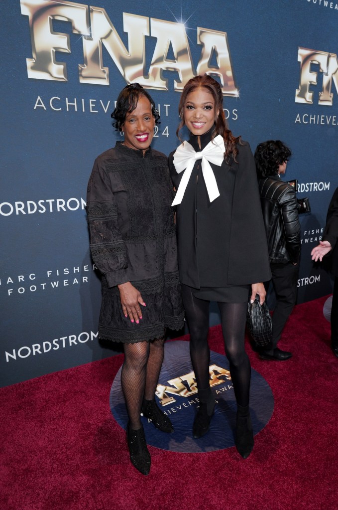 NEW YORK, NEW YORK - DECEMBER 04: Jackie Joyner-Kersee and Gabby Thomas attend Footwear News Achievement Awards (FNAAs) 2024 at Cipriani South Street on December 04, 2024 in New York City. (Photo by Craig Barritt/Footwear News via Getty Images)
