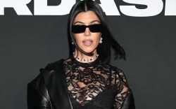 Kourtney Karashian, Boohoo, catsuit, lace catsuit, bra, lingerie, boots, black boots, heeled boots, Travis Barker, Fashion Week, fashion show, New York Fashion Week, NYFW