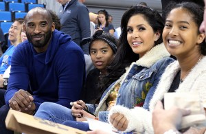 From left, Los Angeles Lakers legend Kobe Bryant, his daughter Gianna Maria-Onore Bryant, wife Vanessa and daughter Natalia Diamante Bryant are seen before a Connecticut-UCLA NCAA women's basketball game in Los Angeles
UConn UCLA Basketball, Los Angeles, USA - 21 Nov 2017