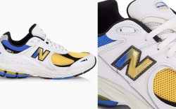 white leather new balance shoes with blue and yellow mesh