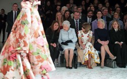 Queen Elizabeth II sits with Anna Wintour (third left), Caroline Rush (left), chief executive of the British Fashion Council (BFC) and royal dressmaker Angela Kelly (fourth left), as they view Richard Quinn's runway show before presenting him with the inaugural Queen Elizabeth II Award for British Design as she visits London Fashion Week's BFC Show Space in central London.Queen Elizabeth II attends London Fashion Week, UK - 20 Feb 2018