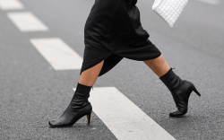 Woman wearing black ankle boots