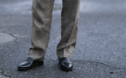 man wearing oxford shoes and dress pants